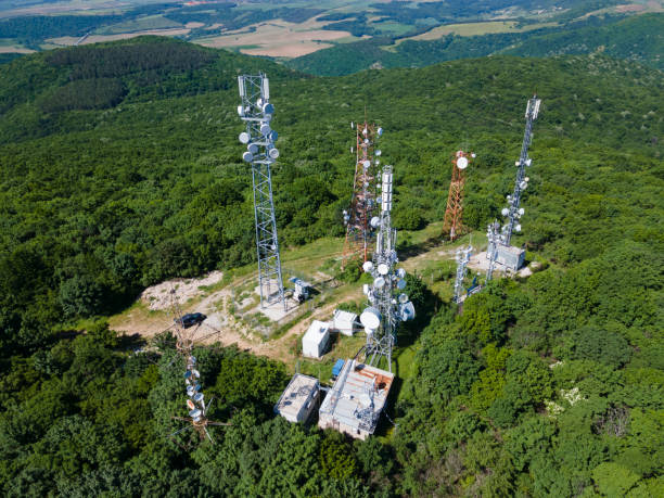 istock Telecommunication towers in greenery, aerial view. 1425049483
