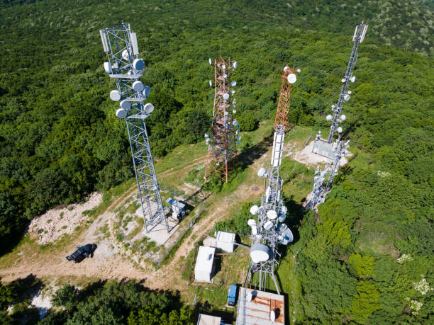 istock Telecommunication towers in greenery, aerial view. 1425049488