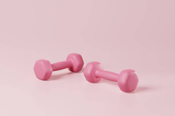 istock Minimal pink dumbbell on pink background. Weight training activity, bodybuilding exercise, daily gym and fitness, dieting for health, sport heavy for muscular building equipment concept. 3d rendering 1425056306