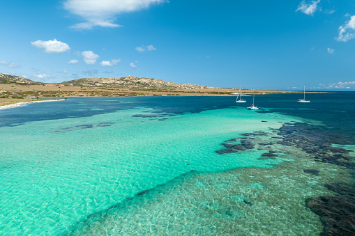 Stintino is located on the peninsula of the same name, running from Nurra plain to the Asinara Island, part of the Asinara National Park, for which Stintino is the nearer embarkment place. The municipality borders with Sassari and its northernmost point, a cape in which is located the town, is in front of the Asinara, who belongs to the municipality of Porto Torres.