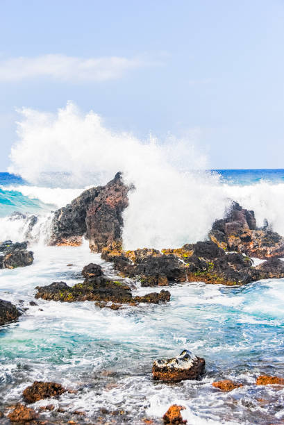 istock Sea waves hitting rocks near Hookipa Beach, Maui 1425067024