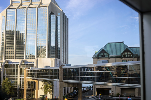 Halifax, Canada - August 29, 2022. Views of the pedestrian walkway in downtown Halifax, connecting several blocks. Specifically, here approaching Purdy's Landing and the Marriott Hotel.