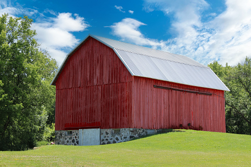 a retro vintage red old barn rural farming painted storage farmyard wooden farm buildings yard