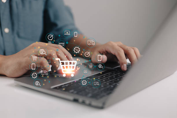 istock Concept of online purchasing and e-commerce using a laptop computer and a credit card, with a delivery vehicle as the final product. 1425081207