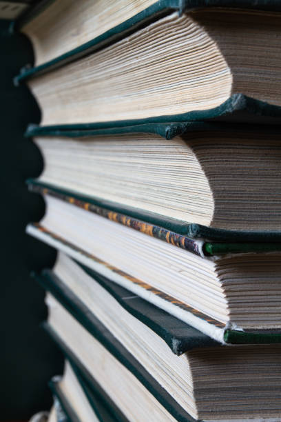 istock several books are stacked on top of each other 1425084377