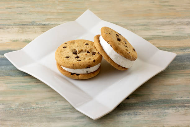 istock Two chocolate chip cookie vanilla ice cream sandwiches 1425090988