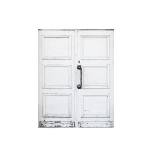 istock Old white wooden door isolated on white 1425091196