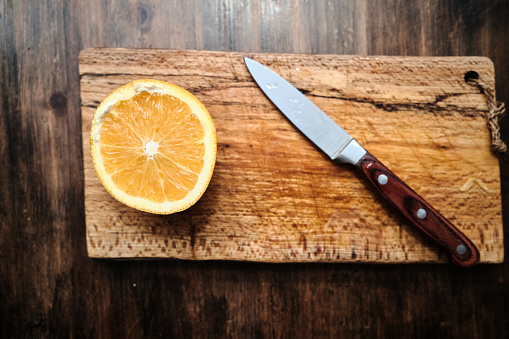 knife and cut out orange