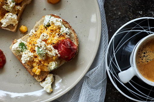 Delicious Brunch Toast: smashed egg, tomato and cheese