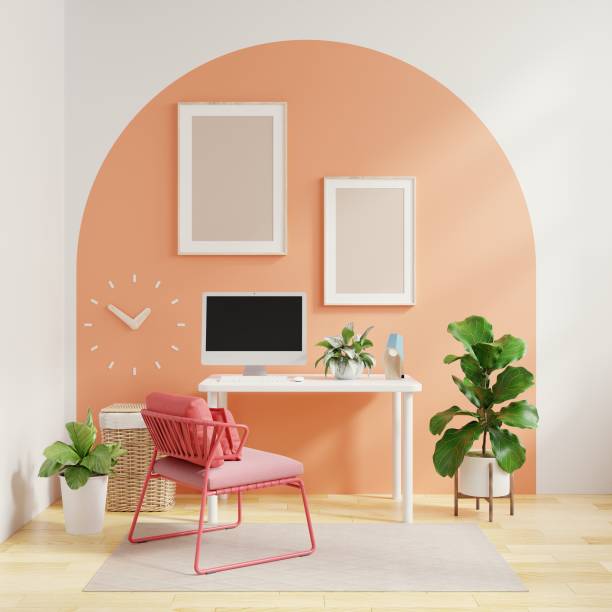 istock Mockup poster frame in office room with a two tone and pastel background. 1425095657
