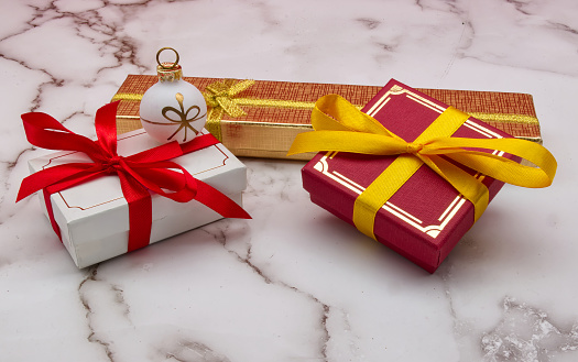 Close up of gift boxes with colorful ribbons. This file is cleaned and retouched.