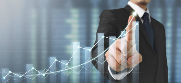 istock Businessman plan graph growth and increase of chart positive indicators 1425098160