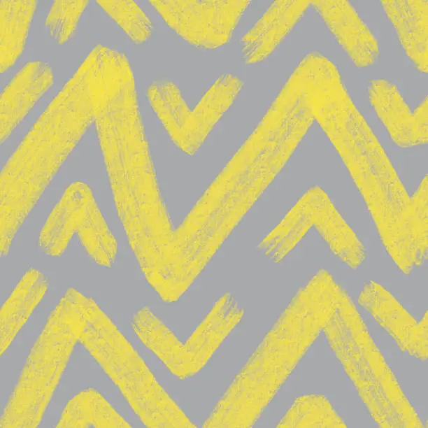 Photo of Painted Zig-Zag ornament. Dry Ink. Doodle hand-crafted style. Brush stroke. Endless repeatable pattern. Gray and yellow texture. Trendy popular colors.