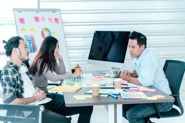 istock Creative design office center working teamwork. Happy business people partner plan strategy organization research people together at diversity office using laptop, smartphone company conference room 1425100473