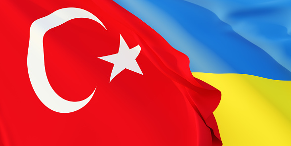 Turkish and Ukrainian flags flying in the wind. Türkiye stand with Ukraine. 3D rendered image.