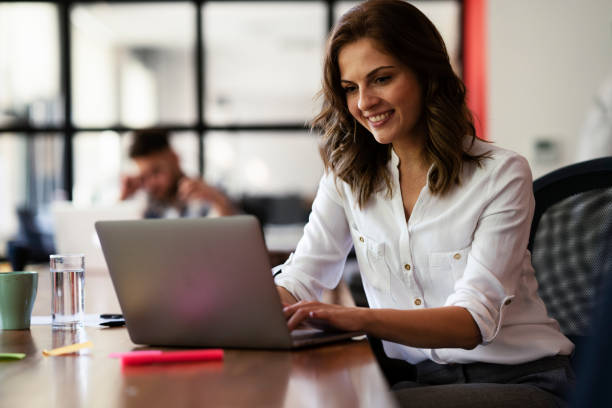 istock Young woman working on laptop 1425113721