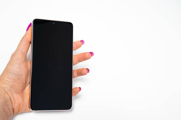 woman hand with nails manicure holding smartphone with blank black screen on white background, place, space for text, insert picture, modern technology, connection internet, wi-fi, messaging, isolated