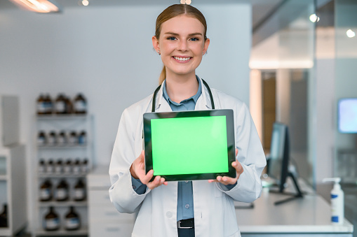 Scientist mockup, green screen tablet and chroma key in hands of medical worker for advertising, marketing or product placement. Advert, space and digital display to endorse a product or FDA approval
