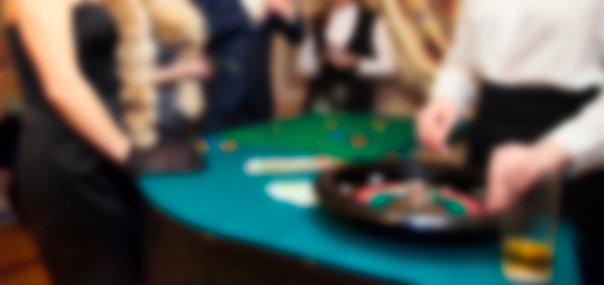 Abstract blurred colored background of gambling house with players, for web design with text place, blur background of wallpaper. Artistic style defocused backgrounds for designer. Copy space
