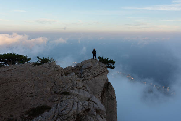 istock Traveler. A man in the mountains. 1425127629