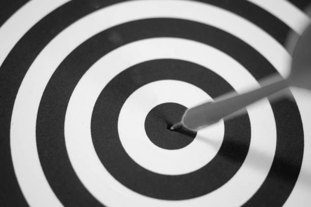 Goal,Target with arrow in the center,black and white stock photo