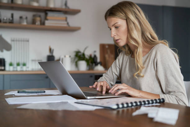 istock Focus caucasian woman working at home 1425130163