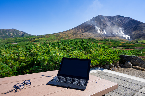 remote working at beautiful volcano (mt.Asahidake,Hokkaido,Japan)