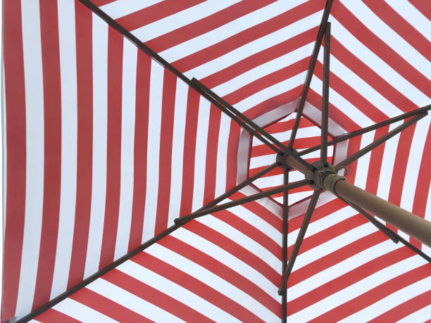 istock abstract under to top partial view of a big size wood structure with red and white stripe in hexagon fabric shield outdoor umbrella 1425133684