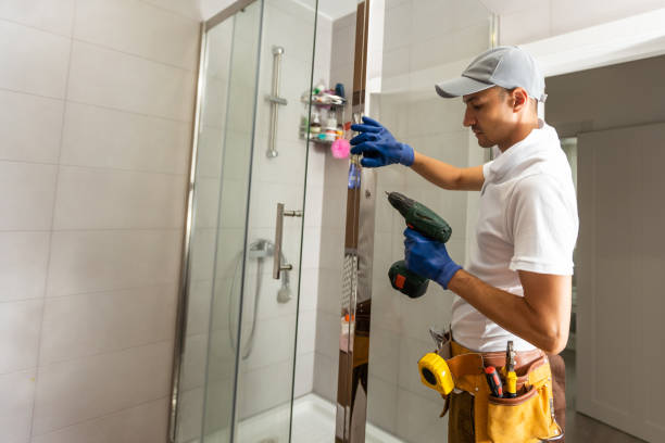 istock Young plumber fixing shower cabin 1425133910