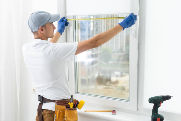 istock Using drill by installing windows. Repairman is working indoors in the modern room 1425134116