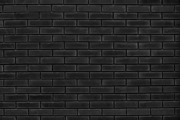 istock Black brick wall texture. Grunge old brickwork dark background 1425135226