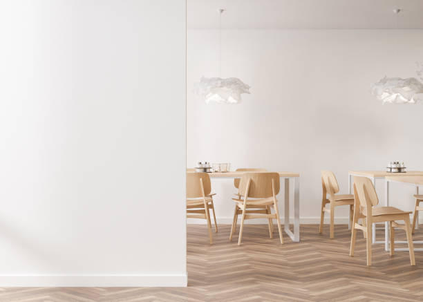 istock Empty white wall in modern cafe. Mock up restaurant interior in contemporary style. Free, copy space for your advertising banner, artwork, picture, text, or other design. Empty space. 3D rendering. 1425136236