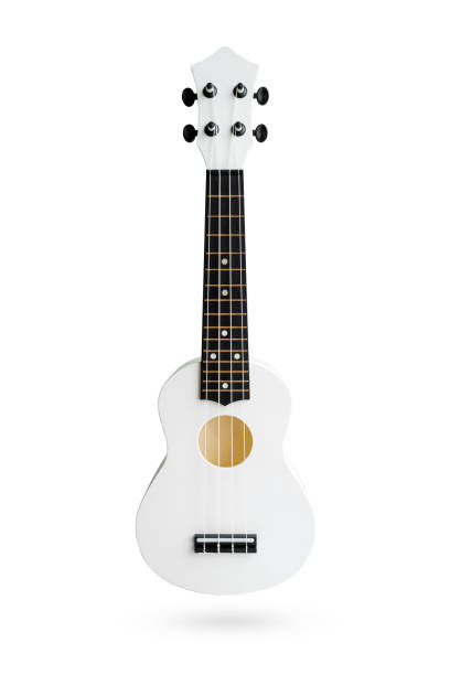 istock Small Hawaiian four stringed ukulele guitar isolated on white background with clipping path. Musical instruments shop or learning school concept 1425138067