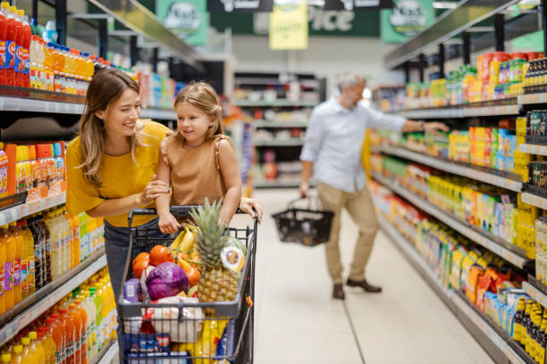 istock Mother and Child at Grocery Store 1425138534