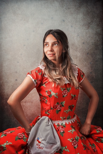 young chilean woman with national dress or folk costume to celebrate national holidays portrait