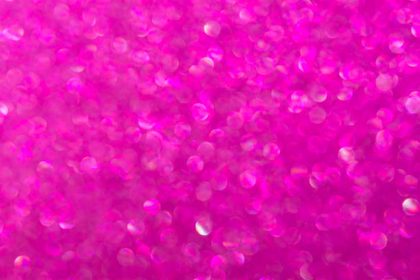 istock Abstract pink magenta background with unfocused bokeh. 1425145793