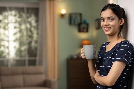 Indian young woman at home