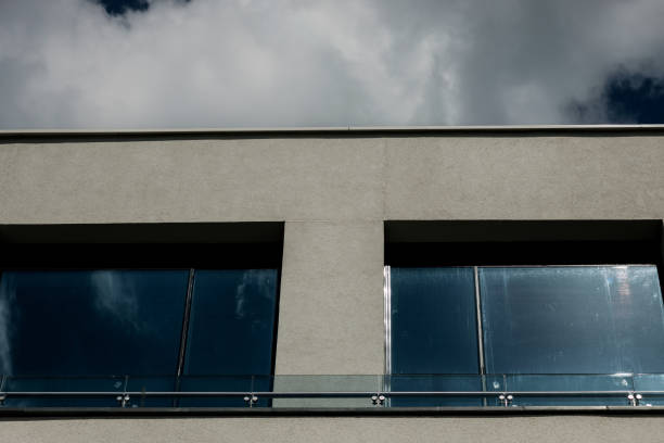 istock concrete facade of office building 1425152522