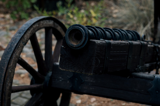 historic cannon in a park. Old vintage gunpowder cannon