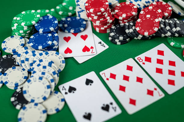 istock Poker cards with three of a kind or set combination. 1425152871