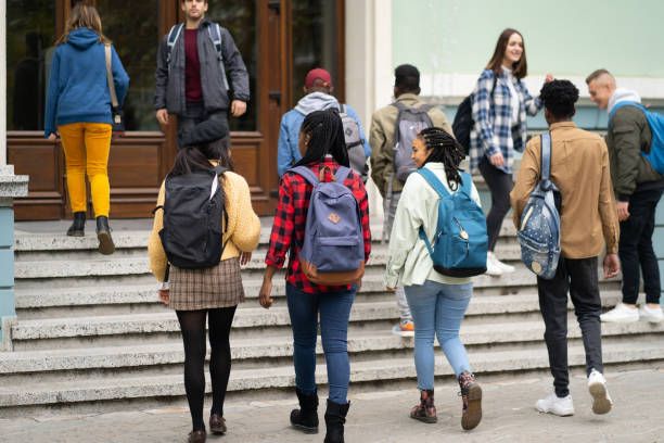 istock Students going to the University. Rear view 1425154822