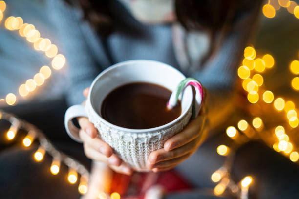 istock A cup of coffee snuggled into a mug jacket 1425156546