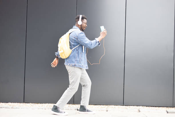 istock Young African American dancing and enjoying music 1425157029