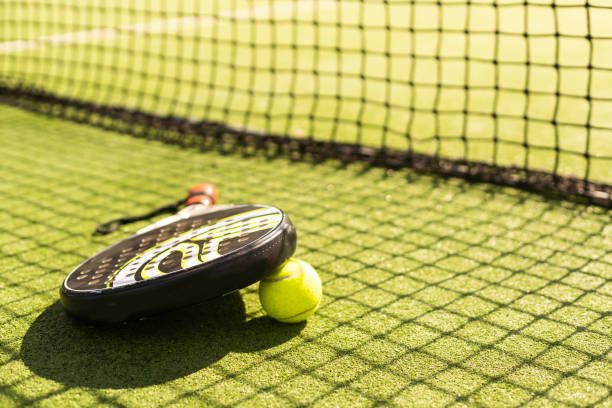 padel tennis racket sport court and balls. stock photo
