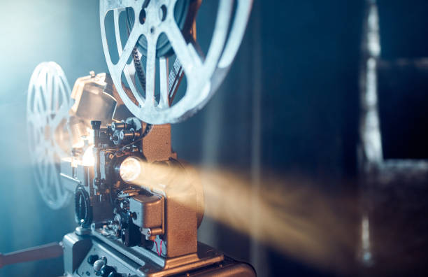 Old Movie Projector Is Showing Movie - fotografia de stock