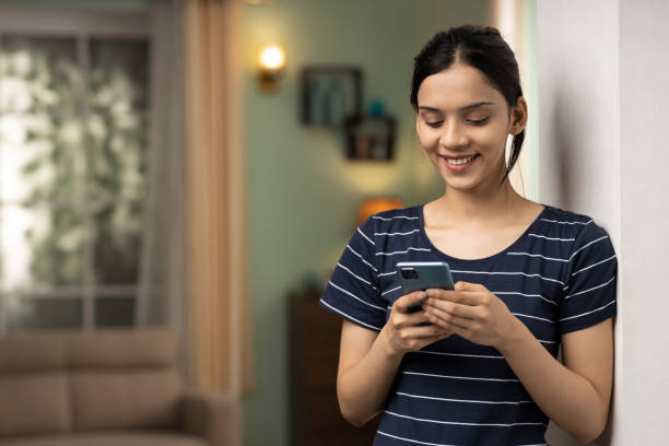 istock Young woman using phone, stock photo 1425162228