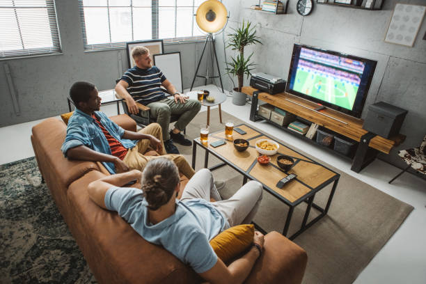 istock Watching soccer championship at home 1425166667
