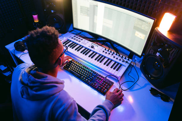 istock Young sound producer working at studio 1425171605