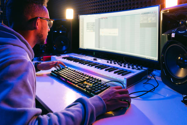 istock Young sound producer working at studio 1425171607