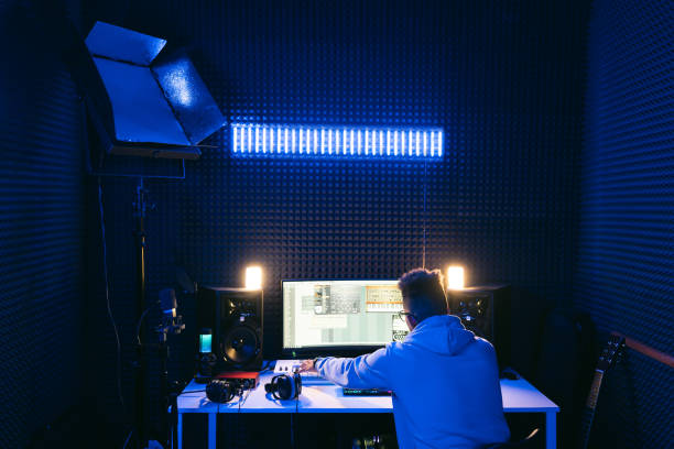 istock Young sound producer working at studio 1425171708